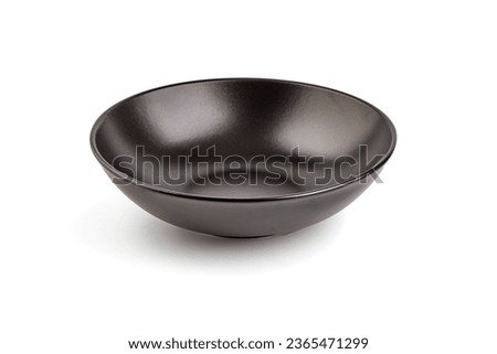 Ceramic black matte bowl, isolated on white background