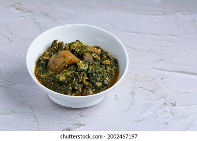 A Ceramic Bowl Of Seafood Okra Soup