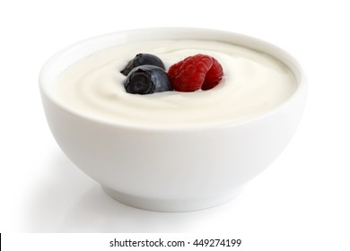 Ceramic bowl of white yogurt with berries isolated on white background. - Powered by Shutterstock