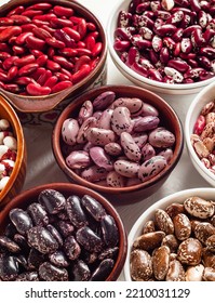 Ceramic Bowls With Different Organic Beans. Scarlet Runner, Kidney, Anasazi, Pinto Beans. Plant Foods Rich In Protein.