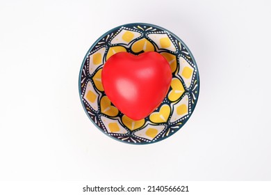 Ceramic Decorated Food Bowl With Three Dimension 3d Red Hart Symbol Inside On White Background Copy Text Space Top View