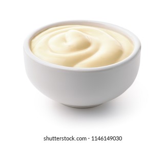 Ceramic dip bowl full of mayonnaise isolated on white