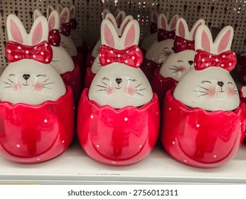 Ceramic Easter Bunny Figurines Emerging from Red Egg Shells