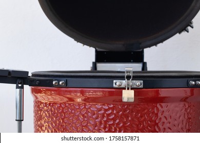 Ceramic Egg Smoker. Red Bbq Close Up.white Background. Backyard Grilling. Kamado Joe