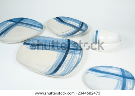 Similar – Artistic broken plates