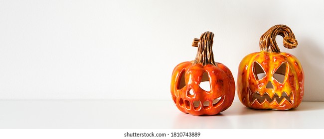 Ceramic Jack Lanterns On Table Wall Background. Minimal Home Decor, Banner Format