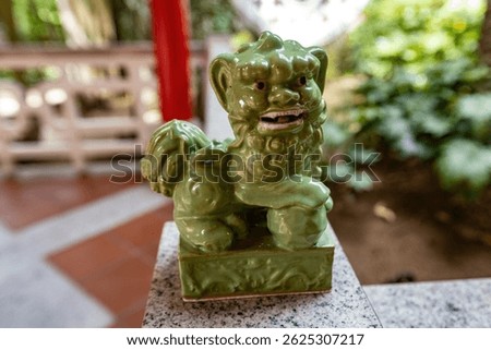 Ceramic lion figurine in the Chinese garden in Macau