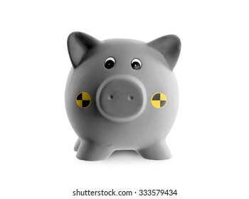 Ceramic piggy bank (crash test dummy) isolated on white - Shutterstock ID 333579434