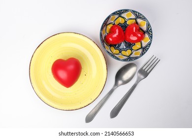 Ceramic Retro Flower Decorated Food Bowl And Plate Fork Spoon With Small Big Three Dimension 3d Red Hart Shape Symbol On Top Of It White Background Copy Text Space Top View