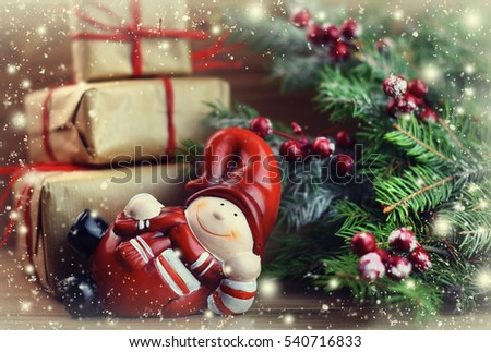 Ceramic Santa Claus with Christmas gifts.