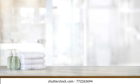 Ceramic Soap Green Bottles And White Cotton Towels On A Marble Counter Table Inside A Bright Bathroom Background.