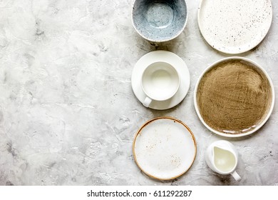 ceramic tableware top view on stone background mock up