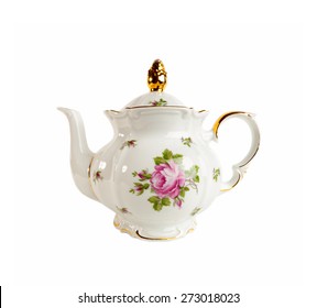 Ceramic teapot with ornament of roses and gold in classic style isolated on white