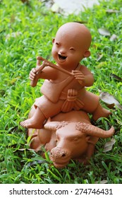 Ceramic Thai Boy Doll Ride Buffalo And Play Slingshot