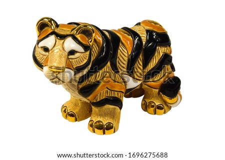 Ceramic tiger figure isolated on white background