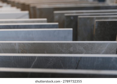 Ceramic tile samples arranged for viewing, offering a range of material finishes and colors for home renovation and interior design projects