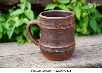 Ceramics, a ceramic product made with their own hands, made on a potter's wheel, jug, mug, clay, ornament. - Shutterstock ID 2220799815
