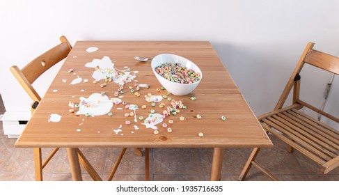 Cereal Bowl Spilled On A Wooden Table