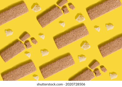 Cereal Healthy Snack, Tasty Cheese Crackers. Fitness Food. Pattern With Oatmeal Bar And Parmesan Cheese On Yellow Background. 