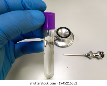 Cerebro Spinal fluid (CSF) transparent sample, which is ready for biochemical test (Glucose, Protein, ADA) and Cytology, Malignant cells.
 Closeup - Shutterstock ID 1945216552