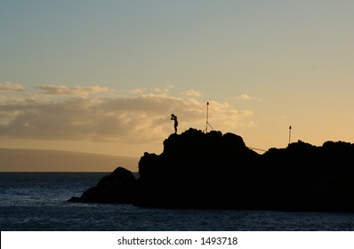 Ceremonial Sunset Dive Off Black Rock In Maui, Hawaii