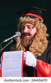 CERKNO, SLOVENIA - FEBRUARY 21, 2012 - Judge Reading A Bill Of Indictment Scroll Called 