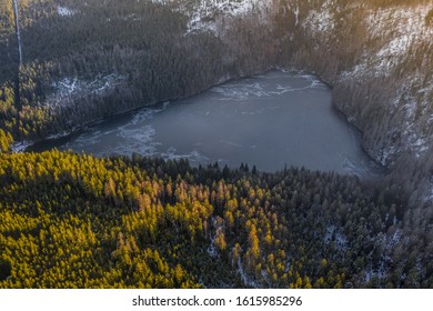 Cerne jezero in the Bohemian Forest is the largest and deepest natural lake in the Czech Republic. This triangular lake surrounded with spruce forest is located about 6 km northwest of Zelezna Ruda. - Shutterstock ID 1615985296