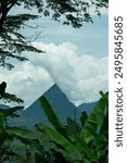 Cerro Tusa, Mount Tusa, Antioquia, Colombia. Blue sky, white clouds, green vegetation.