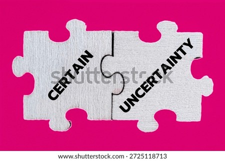 Certain and Uncertainty Concept with Interlocking Jigsaw Puzzle Pieces on Vibrant Pink Background