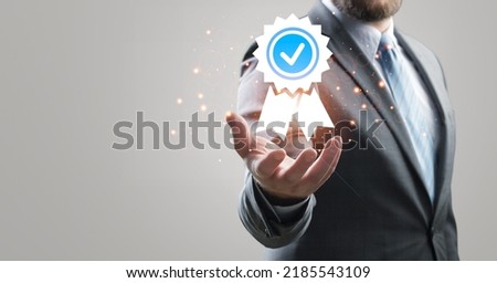 Certification and standardization process, certified business, conformity to international standards and quality assurance concept. Person touching certificate icon.