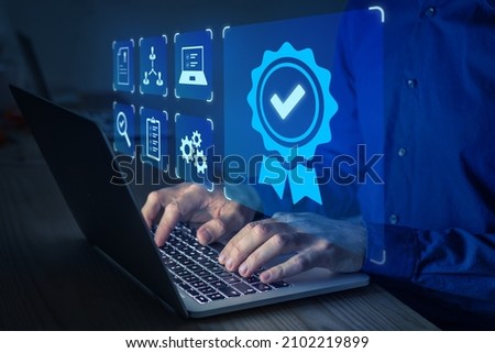 Certification and standardization process, quality assurance and conformity to international standards. Concept with icons for certificate, approval, compliance to requirements. Person using computer