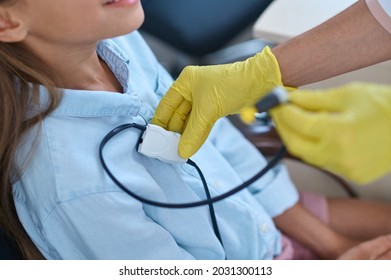 Certified Doctor Getting The Patient Ready For An Audiometry Test