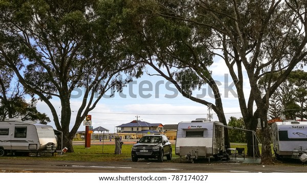 Cervantes, Western Australia - September 2,\
2017 : Caravans and four wheel drive truck are parking at a camping\
site in RAC\
Cervantes,