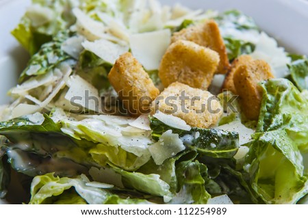 Cesar Salad in a salad bowl at a restaurant