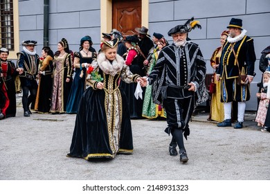 Cesky Krumlov, Bohemia, Czech Republic, 23 April 2022: Historical parade or festival, beginning of the season, men and women in renaissance costumes, Gothic dance performances, medieval entertainment 