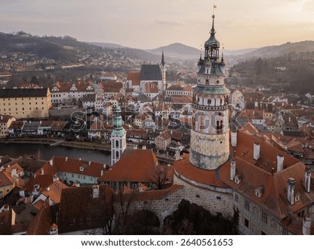 Cesky Krumlov, Czech Republic: Dramatic aerial view of the stunning medieval Cesky Krumlov old town with the St Vitus church and the castle tower at sunset in the Czech Republic.