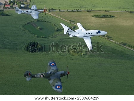 Cessna Citation Mustang C-510, Mustang P-51 and Supermarine Spitfire in flight photo