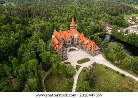Cesvaine medieval castle in Latvia from above, top view. A manor house of the late 19th century.