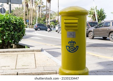 Ceuta, Spain; February 11 2022: Yellow Mailbox In The Street, Spanish Postal Service Logo