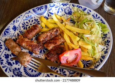Cevapi also called Cevapсici - small sausages from chopped pork and beef with spices. Very popular dish in the Balkan countries