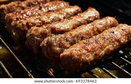 Cevapi on barbecue or grill, Balkan cuisine