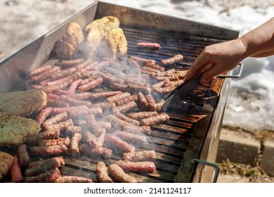 Cevapi on barbecue grill with coal