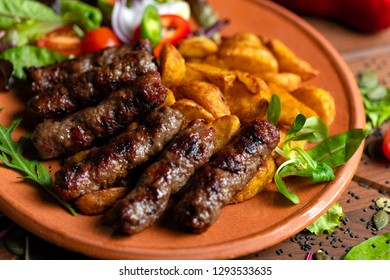 Cevapi with potatoes