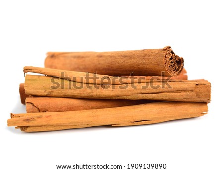Ceylon Cinnamon or True Cinnamon Quills (Cinnamomum Verum). Also known as Sri Lanka Cinnamon or Cinnamomum Zeylanicum. Isolated on White.
