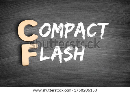 CF - Compact Flash is a flash memory mass storage device used mainly in portable electronic devices, acronym text concept on blackboard