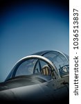 CF-18 fighter cockpit against a blue summer sky