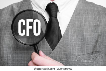 Cfo Acronym Of Master Of Business Administration Degree. Education Concept. Businessman Hands With Magnifier.