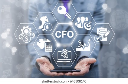 CFO - Chief Financial Officer Business Concept. Leadership, Mobile Internet Technology, Finance, Strategy Office Work. Businessman Offers Smart Phone With CFO Icon On Virtual Screen.