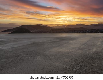 cgi backplate production.asphalt car park with beautiful city skyline - Shutterstock ID 2144706957