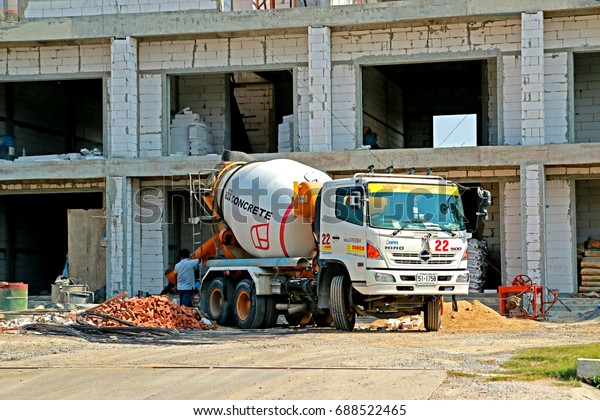 CHACHEANGSOW-THAILAND-APRIL 7 : The concrete mix\
truck at work-site on April 7, 2015 Chacheangsow Province,\
Thailand